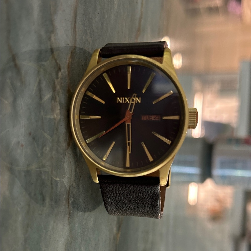 Nixon Gold and Black Watch Sentry
